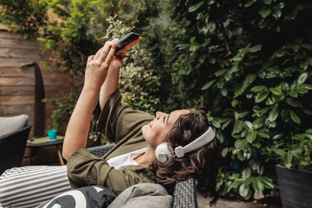 istock Young woman enjoying a day off at home 1256339949