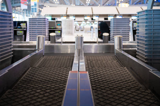 istock Empty airport check-in counter while coronavirus pandemic 1256339971