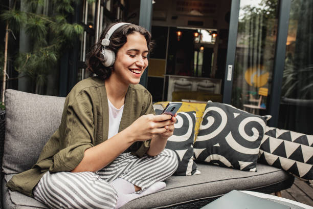 istock Young woman enjoying a day off at home 1256340486