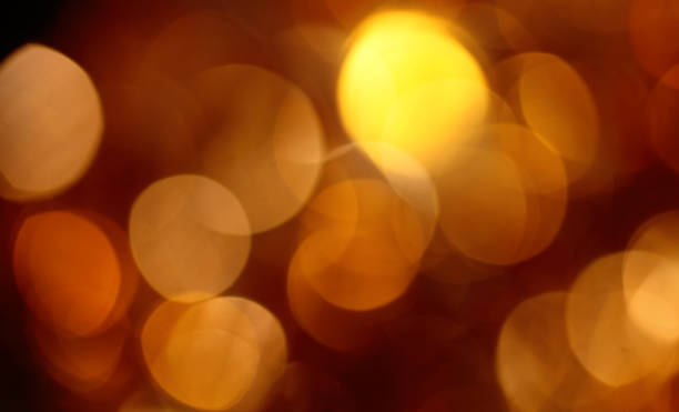 istock Gold blurred background bokeh, celebration, party, abstract, background, blur, bokeh, bright, Christmas, focus, holiday lights glitter 1256347197