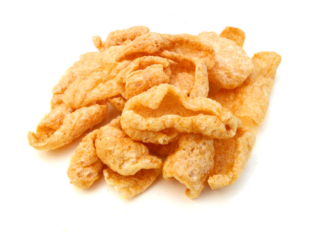istock pork rinds on isolated white background 1256349270