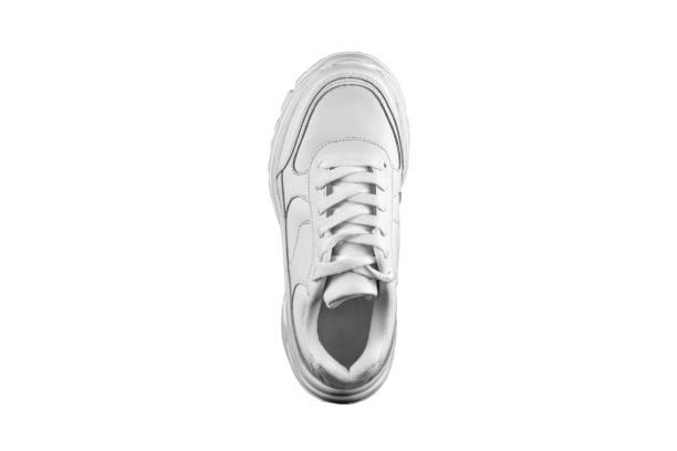 istock One white sneaker top view.Sports shoes. 1256349447