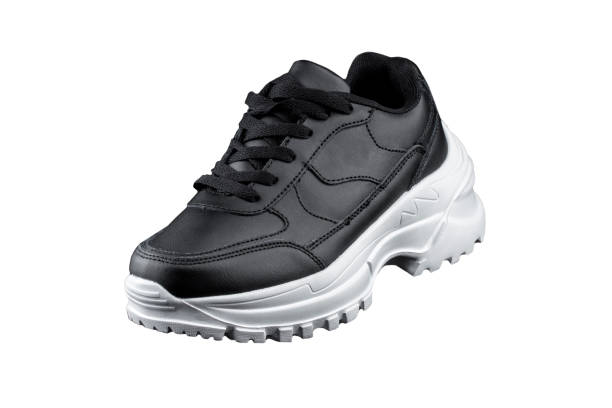 istock Black sneaker with white sole. Sport shoes. 1256349467