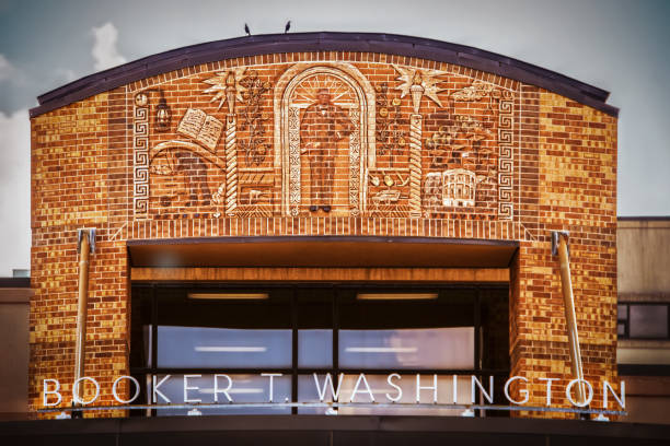 The facade and relief carving of Booker T Washington above entrance of magnet school bearing his name in Tulsa USA Tulsa USA 07_06_2020_The facade and relief carving of Booker T Washington above entrance of magnet school bearing his name in Tulsa USA tulsa landmark stock pictures, royalty-free photos & images