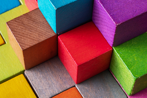 Colorful wooden cubes. Abstract background with cubes.