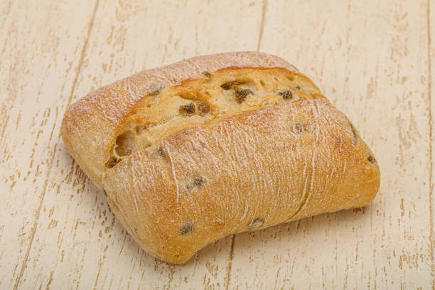 istock Italian ciabatta bread with olive 1256352561