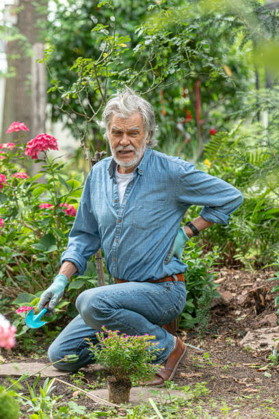 istock Senior adult gardening 1256353348