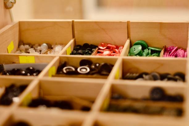 istock Multi-colored buttons for clothing in the Atelier 1256357331