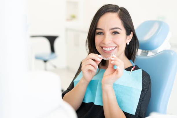 patient with clear aligner at clinic - adult beautiful caucasian equipment imagens e fotografias de stock