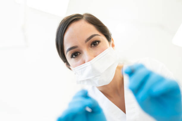 istock Bottom View of Dentist Working At Clinic 1256362587