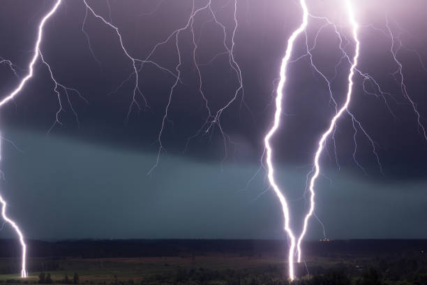 istock strong storm with amazing and dangerous lightning at night 1256366420