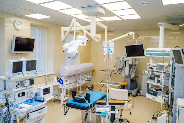 istock Establishing shot of technologically advanced operating room ready for surgery. Real modern operating theater with working equipment, lights and computers. 1256367847