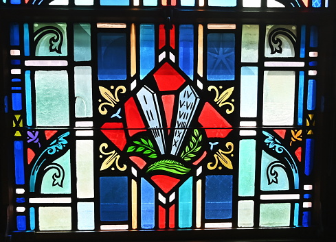 Spiral stained glass window ceiling from inside the prayer chapel of Thanksgiving Square in downtown Dallas, Texas.