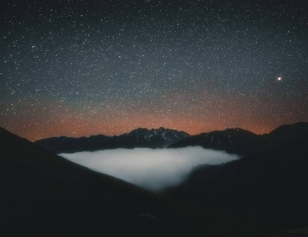 istock Night scene and mountain view from above the clouds 1256374685