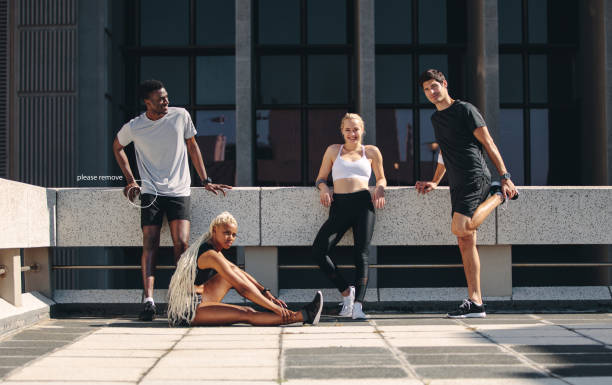 istock Group of runners resting after training session 1256375819
