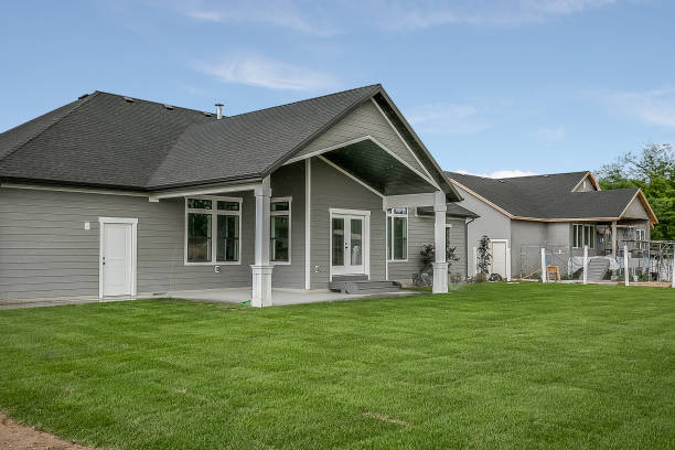 istock Back yard and exterior of new home 1256377237