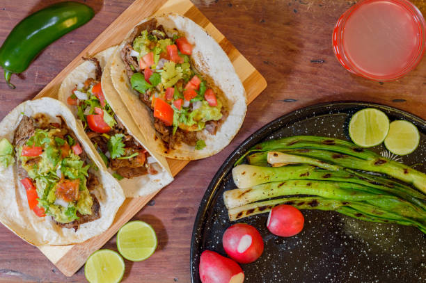 istock Mexican tacos, grilled carne asada with copy space 1256380211
