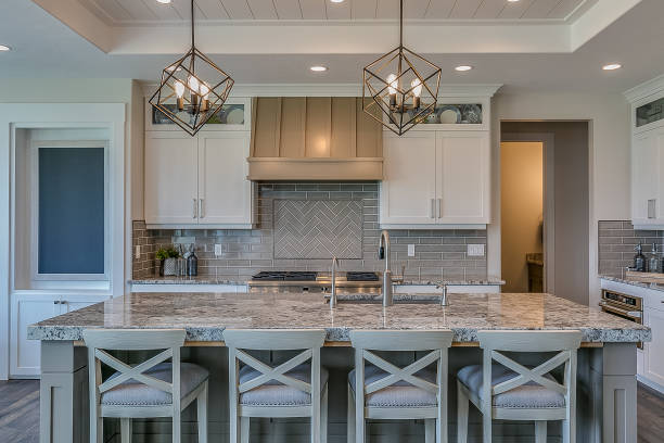 istock Amazing kitchen with quartz counter tops and white cabinets 1256381135