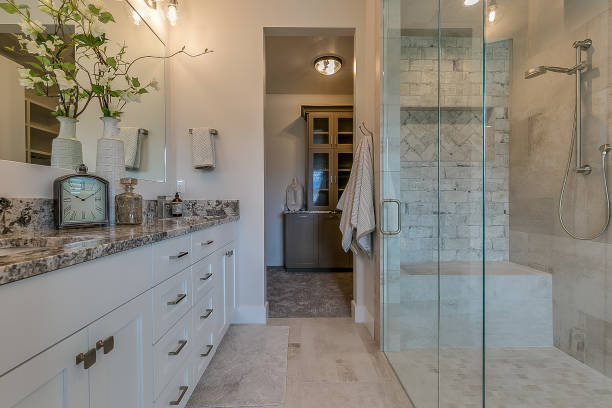 istock Amazing glass shower with extendable shower head 1256381136