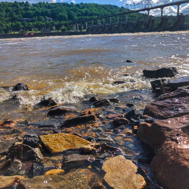 istock River Flowing Over Rock -- Big Dam Bridge 1256382323