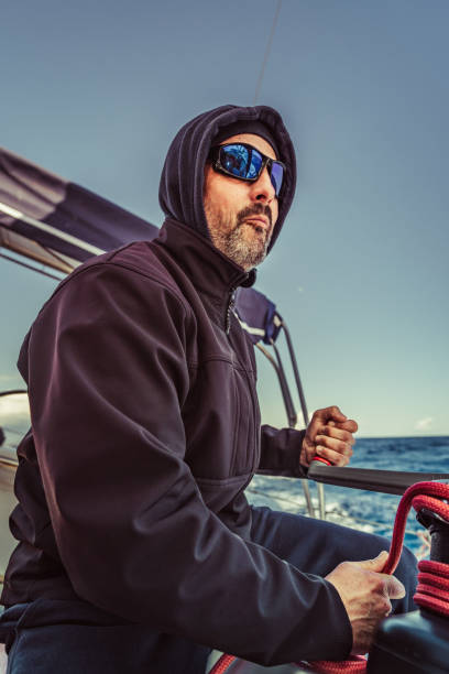 istock adventure man sailing on Aadriatic sea 1256386224