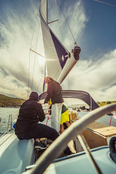 adventure friends on the sailing boat - weather time travel locations nature imagens e fotografias de stock