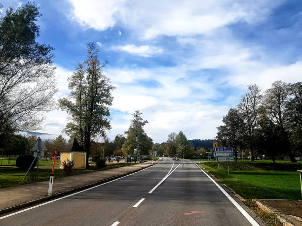 istock Empty road with shadow in salzburg Austria 1256388894