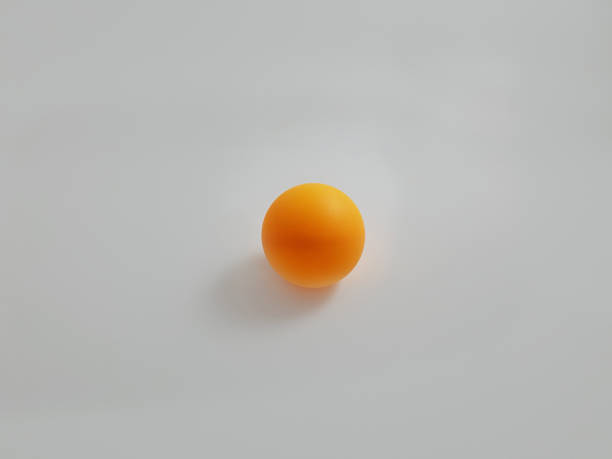 istock Orange Ping Pong Ball, Isolated on White Background 1256390661
