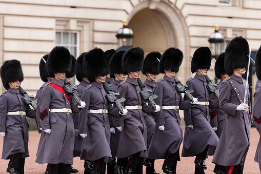 London, UK - Mar 15, 2019: The Coldstream Guard at Buckingham Palace mid day during the iconic changing of the guards ceremony.