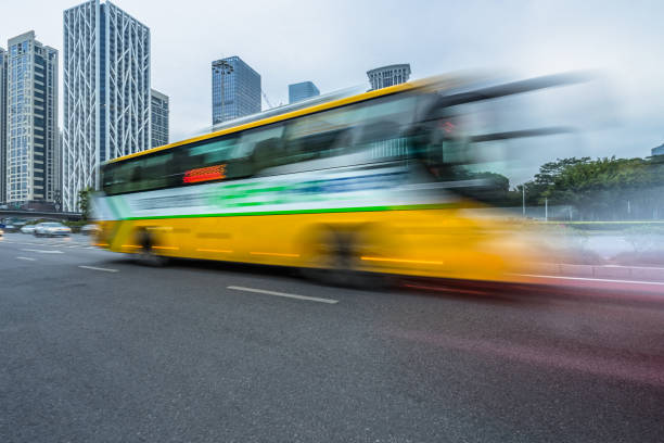 istock Car driving on road in city 1256404854