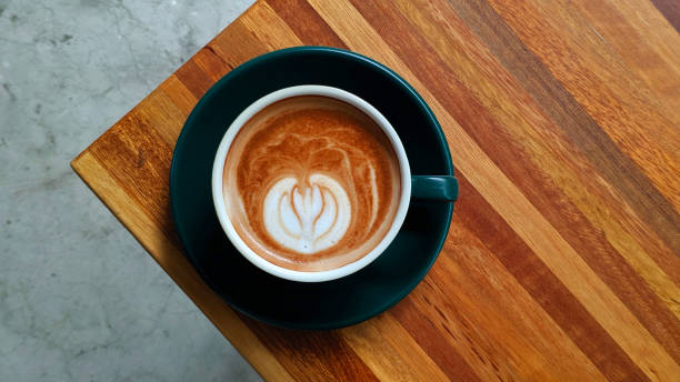 istock Hot Mocha on wooden table 1256404964