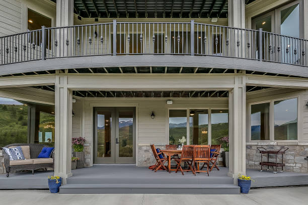 istock Gorgeous luxury home with covered patio and deck above 1256406516