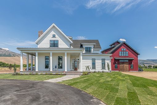 Stately new home with attached red barn which is actually a separate mother-in-law living space