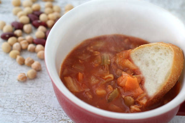 istock Minestrone soup with vegetables, beans, and barley vegan menu 1256415940
