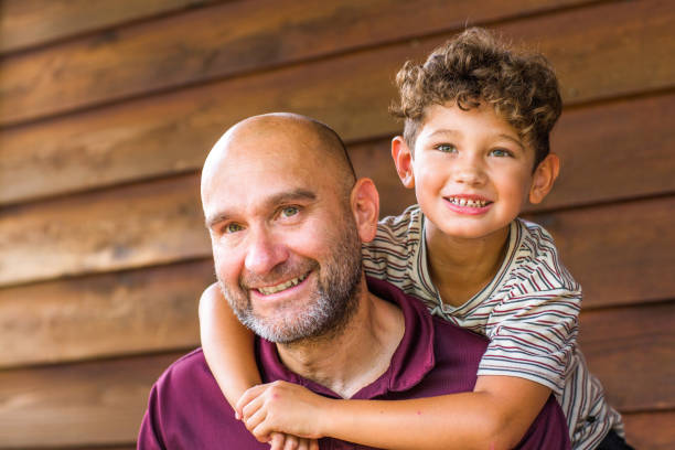 istock Hispanic father spending time with his son. 1256416022