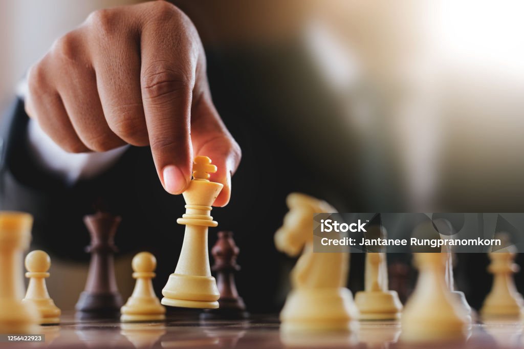 Businessman suit with chess board game. Plan stratgy and tactic concept Chess Stock Photo