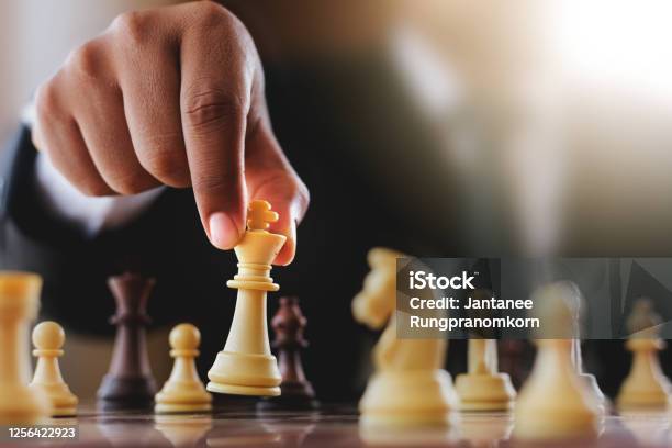 Businessman Suit With Chess Board Game Plan Stratgy And Tactic Concept Stock Photo - Download Image Now