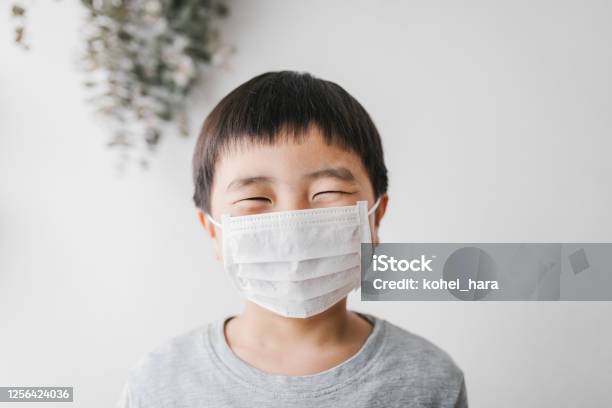 Portrait Of Boy Wearing Mask Stock Photo - Download Image Now - Protective Face Mask, Child, Asian and Indian Ethnicities
