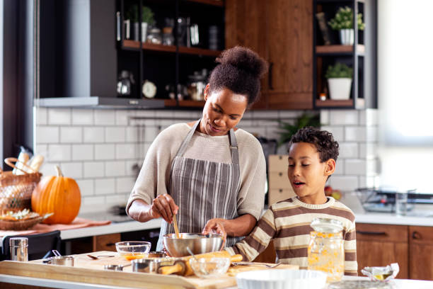 istock Woman prepare pie in the kitchen 1256433598