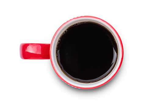 Red ceramic cup of black coffee isolated on white background with clipping path. Top view. Flat lay.