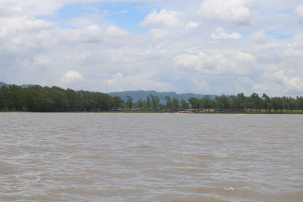 istock rever and forest with hill 1256437173
