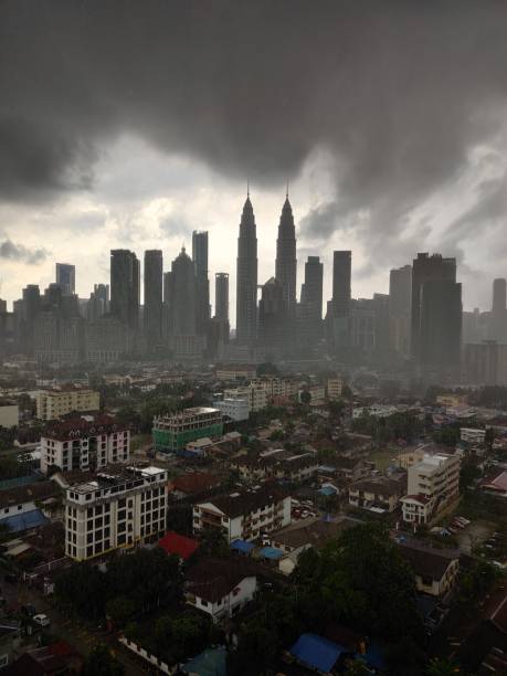 istock Kuala Lumpur skyline during heavy rain 1256438545
