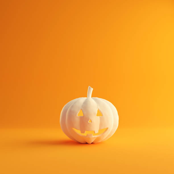 istock Halloween concept, Pumpkin on orange colors background. 1256441913