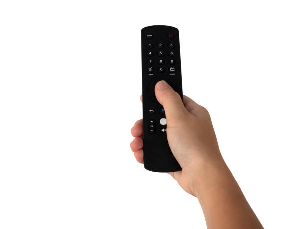 istock Hand holding with multimedia tv remote control isolated on white background with clipping path. 1256443875
