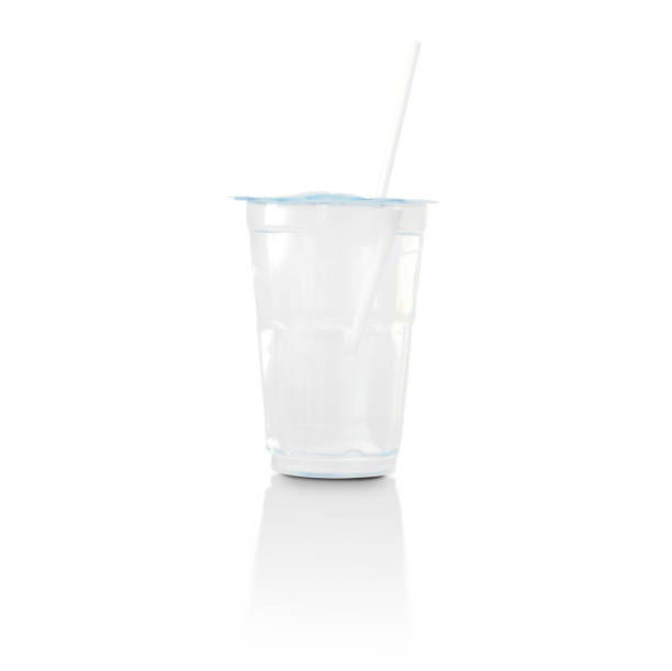 istock Plastic glass with straw isolated on white background. Clipping path 1256443971