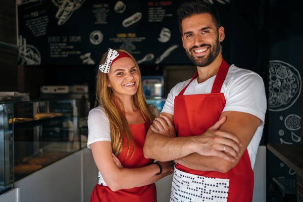istock Portrait of young bakers 1256444369