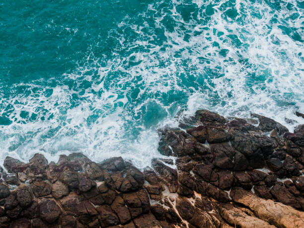 istock Wild rocky place. Aerial view. Sea waves 1256444470