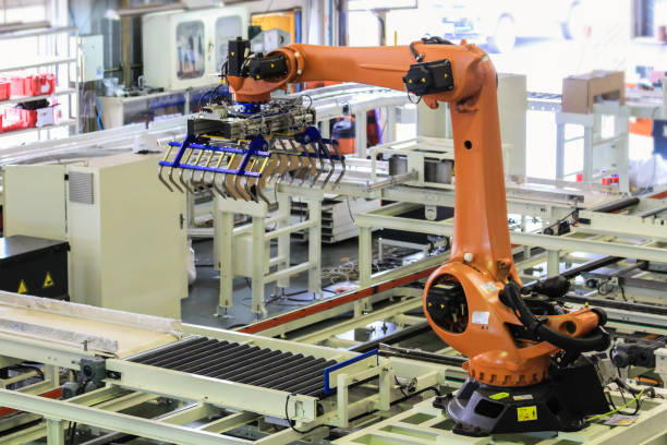istock Industrial robot with gripper unit in smart warehouse 1256445168