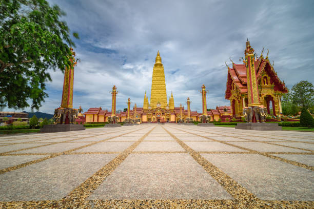 The scenery of the Wat Bang Thong temple (golden pagoda) at Krabi province, Thailand. stock photo