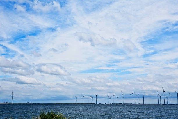 istock Windmills along the coast of Serooskerke 1256447543